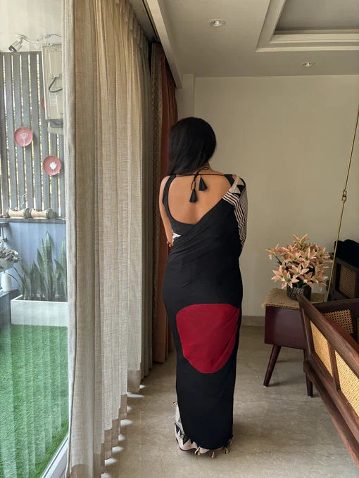 BEAUTIFULL CREAM STRIPTED SAREE WITH RED BINDI PALLU.